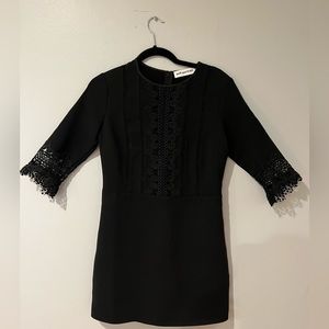 See Portrait Black Mini Dress With Crochet Flower Pattern
